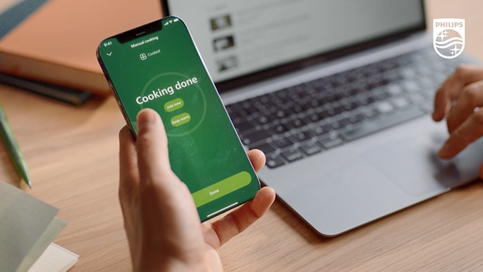 Op afstand voedsel bereiden via de HomeID-app